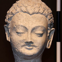 Fig. 23 - Buddha head with traces of blue paint on the hair from Chapel 4 (TN CH 4 no. 28)
