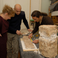 R. Giunta, D. Marletto and F. Colombo discussing the conservation of brick finds at the MNAO, 2008 ©IsIAO archives Ghazni/Tapa Sardar Project 2014